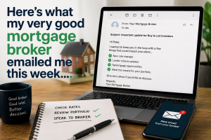image of what my very good mortgage broker emailed me with a computer screen on a desk and a small model house